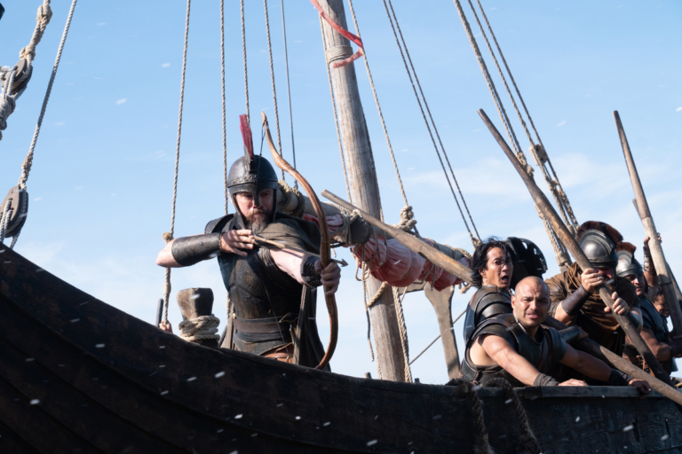 Matt Damon (frame left, with bow) is Odysseus in THE ODYSSEY, written, produced, and directed by Christopher Nolan.